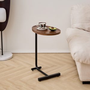 Slim brown C-shaped sofa table with wood-grain top beside a light sofa on wood flooring